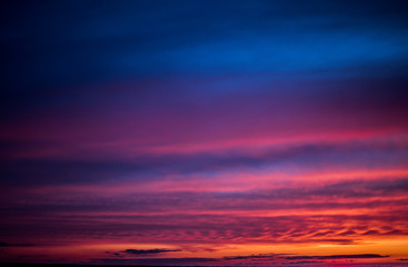 The sky during sunset from a height of a multistory building.