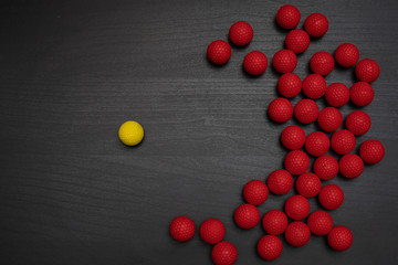 yellow ball repelling red balls