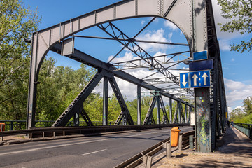 Road entering the bridge on a clear day