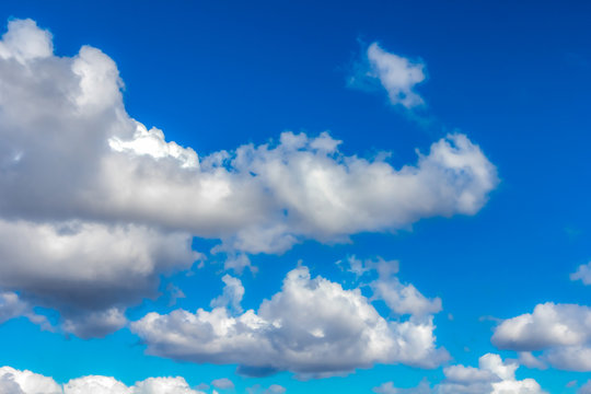 Blue Sky with Cumulus Clouds Background
