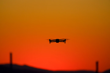 Drone is flying when the sun is going down