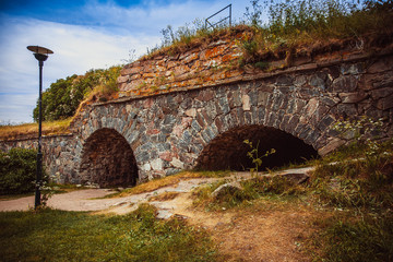 Fototapeta na wymiar Suomenlinna, Helsinki, Finland Summer at Suomenlinna. Sea fortress, built in six small islands just off the Helsinki coast. Popular place for both tourists and locals. 