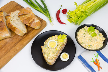 Egg salad on a slice of bread