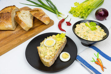 Egg salad on a slice of bread