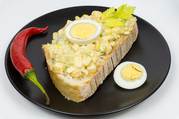 Egg salad on a slice of bread