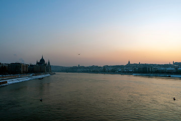 The river Danube on a cold winter day with the Hungarian Parliament building in the background