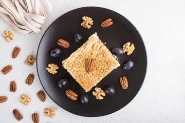 Sweet Pasta pudding with cheese, grapes and nuts