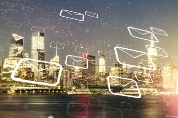 Double exposure of abstract virtual postal envelopes hologram on New York city skyscrapers background. Electronic mail and spam concept