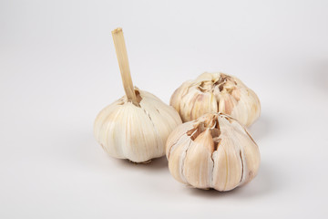 Raw Garlic on White background