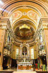 Fototapeta na wymiar Verolavecchia, Italy. Interiors of catholic church (Parrocchia dei Ss. Pietro e Paolo Apostoli di Verolavecchia).