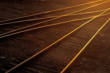Plakat Railroad tracks shine at sunset in Kansas