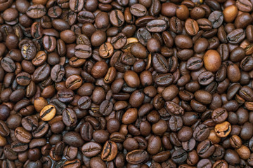 Beautiful fragrant brown coffee, background texture, close-up