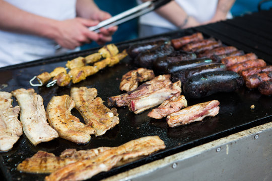 Close-up Of Meat Cooking On Barbecue Grill