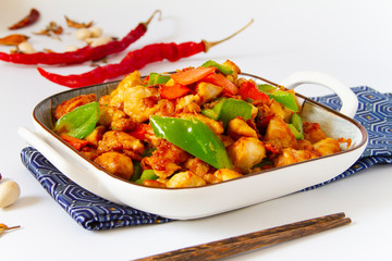 Stir fry chicken with peppers close up