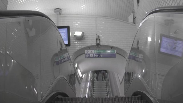 Escalator going up in Parisian subway