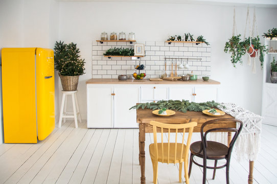  beautiful white cosy modern kitchen interior,kitchenware, home style, with yellow fridge