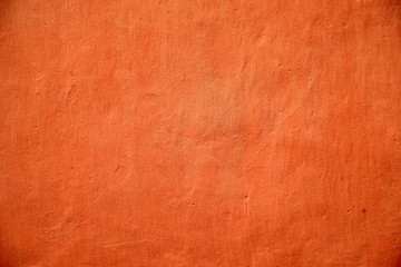 Subdued orange empty background or backdrop material.