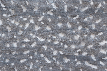 Old weathered granite stone wall textured natural background