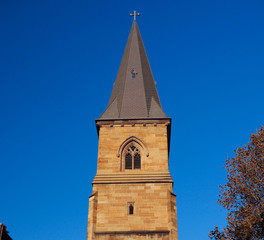 Fototapeta na wymiar Church Tower in Sydney NSW Australia on a beautiful clear blue Sky