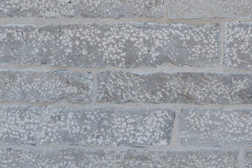 Old weathered granite stone wall textured natural background