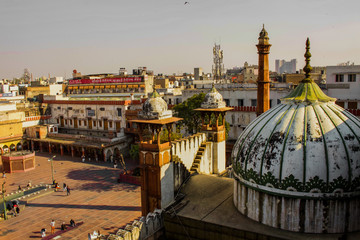 Fatehpuri Mosque in New Delhi at sunset. Translation for signs in back: 