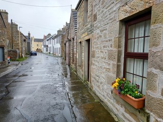 Casual view on the St. Margaret Hope village in Scotland, UK at cloudy weather