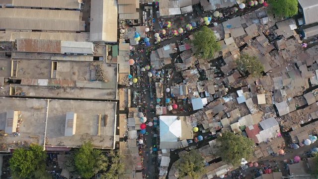 2020 - very good aerial over West African street market in Gambia passes for Guinea, Bissau, Sierra Leone, Nigeria, Ivory Coast or Liberia.