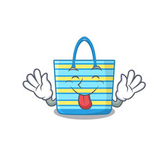 An amusing face beach bag cartoon design with tongue out