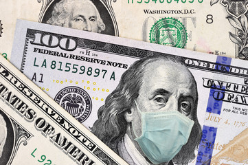 close up of dollar banknote with face mask for background