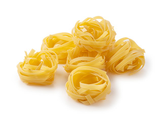 Tagliatelle placed on a white background