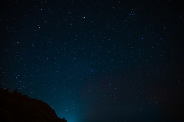 Fototapeta premium Astrophoto, night landscape, horoscopes. Screensaver on the screen, space
