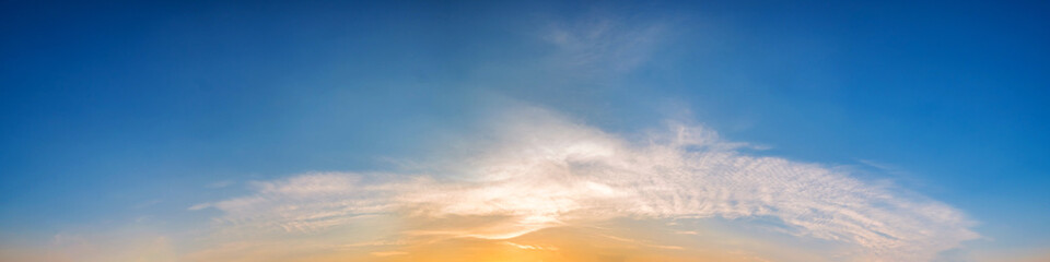 Naklejka na ściany i meble Panorama of Dramatic vibrant color with beautiful cloud of sunrise and sunset. Panoramic image.