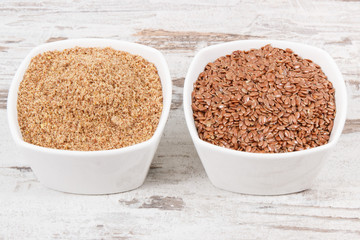 Linseed in glass bowls as healthy food containing vitamins, fiber and acids omega