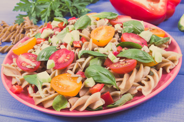 Fresh salad with wholegrain pasta and vegetables. Best food for dieting and slimming