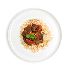 A plate of homemade Beef stew on rice with capsicum and coriander isolated on white background 
