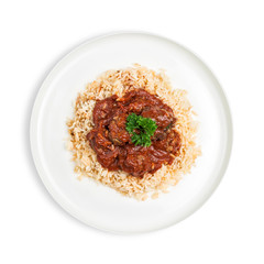 classic Meatballs in tomato sauce served on rice isolated on white 