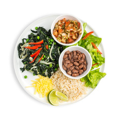 Plate with a Vegan sauteed spinach burrito ingredients: tomato salsa, grated cheese, rice and beans isolated on white