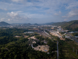 aerial view of the city around the picturesque mountains at sunrise
