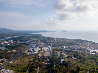 aerial view of the city around the picturesque mountains at sunrise, Kathu, Phuket