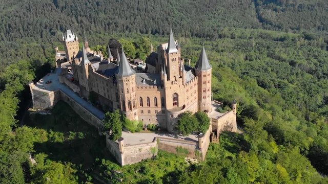 Aerial, orbit, drone shot around the Burg Hohenzollern castle, sunny, summer day, in Baden-Wurttemberg, Swabia, Germany