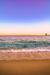 Waves Crashing on the Beach in Mexico at Sunset