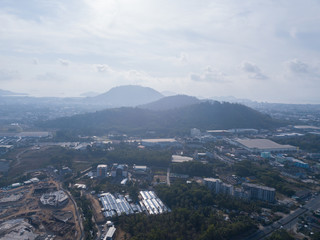 aerial view of the city around the picturesque mountains at sunrise, Kathu, Phuket