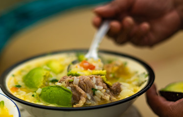 rice soup with vegetables. typical colombian food
