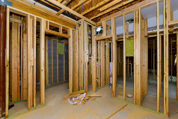 Residential home beams framing stick basement unfinished under construction