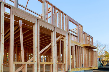 Residential house with under construction beams house wooden frame