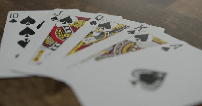 Close Up Panning Shot of a Royal Flush in Poker