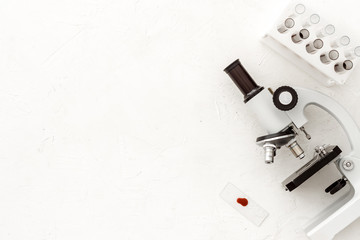 Clinical science research with microscope. Laboratory equipment on white background top view copy space