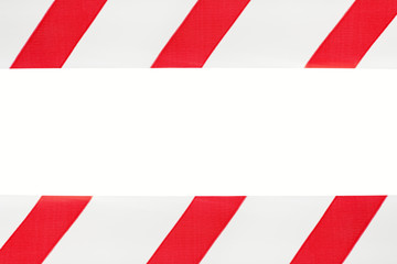 Two red and white warning stripes on an isolated white background, the center space is empty for the text.  Concept for protecting people from coronavirus infection. Coronavirus, Covid-19