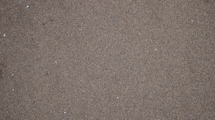 smooth texture grainy background of carrot brown sand