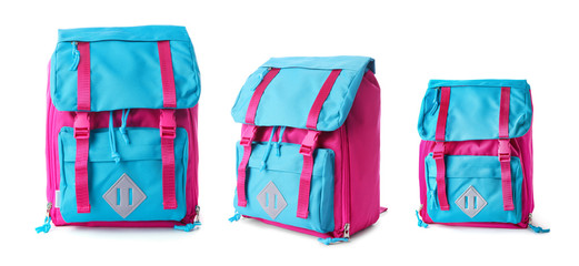 School backpacks of different sizes on white background